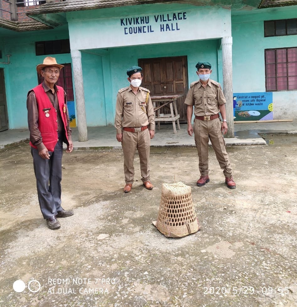 GB of Kivikhu Village, Zunheboto district handing over the rescued bird to Forest Department Officials.